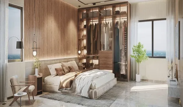Second bedroom with a bed, study desk and window overlooking greenery