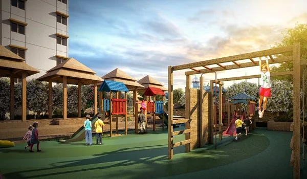 Children's play equipment set within a soft-surfaced landscaped area
